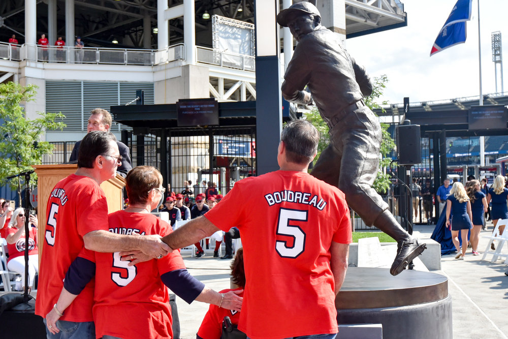 Lou Boudreau's children admire the statue of their father outside of Progressive field on Saturday afternoon. 