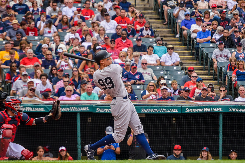 Aaron Judge records a hit in Sunday's win against the Indians at Progressive Field. 
