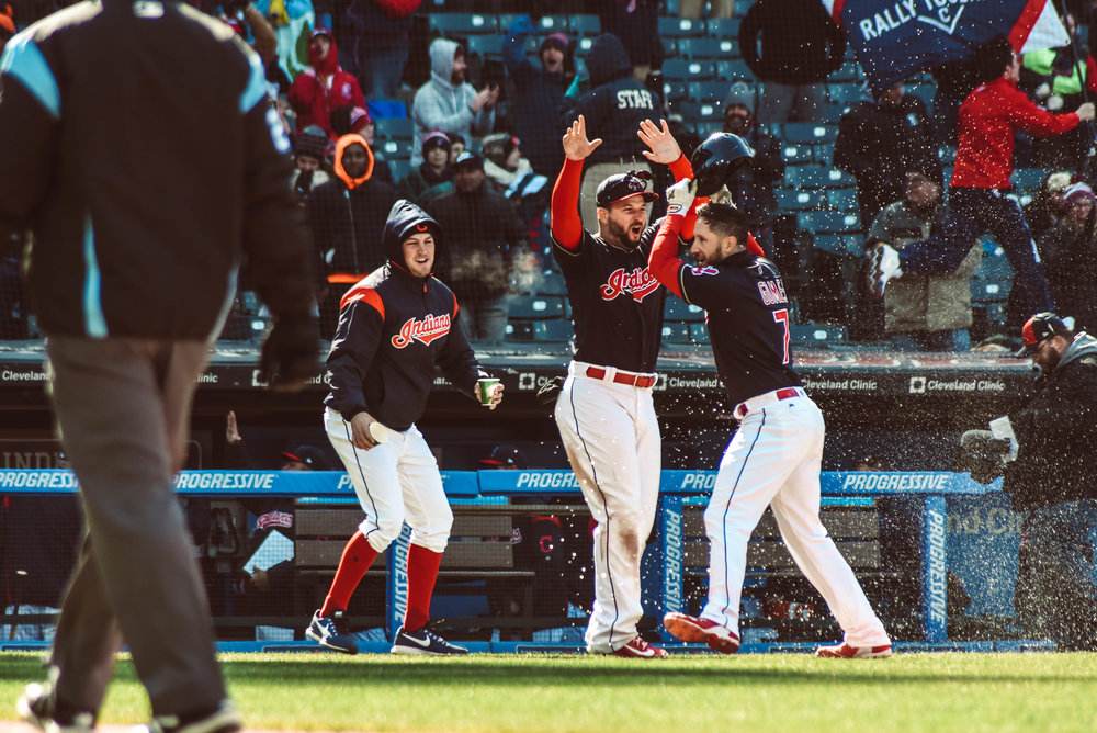  Yan Gomes celebrates his walk off win with his teammates at home plate after his walk off home run.&nbsp; 